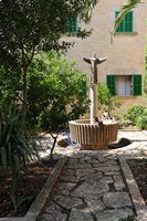 The Sanctuary of Cura de Randa Mallorca - Statue of St. Francis of Assisi. Click to enlarge the image in Adobe Stock (new tab).