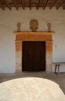 The Sanctuary of Monti-sion Porreres Mallorca - Door of the old En Grammar. Click to enlarge the image in Adobe Stock (new tab).