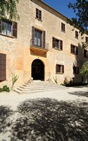 The town of Sant Joan Mallorca - The facade of the mansion Els Calderers. Click to enlarge the image in Adobe Stock (new tab).