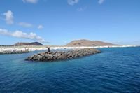 The island of Graciosa to Lanzarote. Port of Caleta del Sebo. Click to enlarge the image in Adobe Stock (new tab).