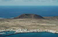 The island of Graciosa to Lanzarote. La Montaña del Mojon. Click to enlarge the image in Adobe Stock (new tab).