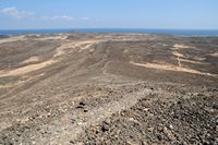 The island of Lobos in Fuerteventura. Lava flow of Caldera. Click to enlarge the image in Adobe Stock (new tab).