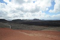 Timanfaya National Park in Lanzarote. The Fire Mountains views from the Islote de Hilario. Click to enlarge the image in Adobe Stock (new tab).