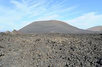 Timanfaya National Park in Lanzarote. La Montaña de Mazo view from the park entrance. Click to enlarge the image in Adobe Stock (new tab).