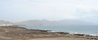 The Jandía Natural Park in Fuerteventura. Puertito de la Cruz seen from Punta de Jandía. Click to enlarge the image in Adobe Stock (new tab).