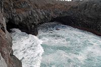 The natural park of los Volcanes in Lanzarote. The Cliffs of Los Hervideros. Click to enlarge the image in Adobe Stock (new tab).