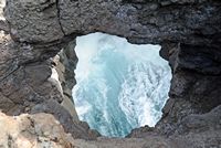 The natural park of los Volcanes in Lanzarote. The Cliffs of Los Hervideros. Click to enlarge the image in Adobe Stock (new tab).