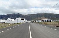 The village of La Caleta de Famara in Lanzarote. Avenida El Marinero. Click to enlarge the image in Adobe Stock (new tab).