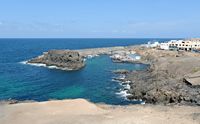 The village of El Cotillo in Fuerteventura. The port. Click to enlarge the image in Adobe Stock (new tab).