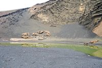 The village of El Golfo in Lanzarote. Crater of El Golfo volcano. Click to enlarge the image in Adobe Stock (new tab).