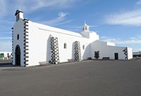 The village of Mancha Blanca in Lanzarote. Iglesia de Nuestra Señora de Los Dolores. Click to enlarge the image in Adobe Stock (new tab).