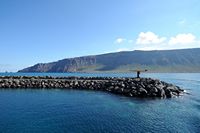 The village of Órzola in Lanzarote. La Punta Fariones view from the island of La Graciosa. Click to enlarge the image in Adobe Stock (new tab).