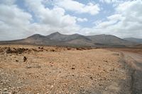 The village of Tindaya in Fuerteventura. The mountain of Tindaya. Click to enlarge the image in Adobe Stock (new tab).