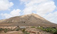The village of Tindaya in Fuerteventura. The mountain of Tindaya. Click to enlarge the image in Adobe Stock (new tab).