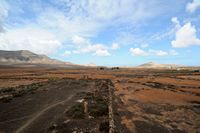 The village of Tindaya in Fuerteventura. Morro de los Rincones and the Montaña Tindaya seen from La Oliva. Click to enlarge the image in Adobe Stock (new tab).