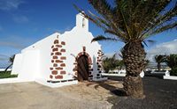 The village of La Vegueta de Yuco in Lanzarote. The Chapel of Our Lady of Regla. Click to enlarge the image in Adobe Stock (new tab).