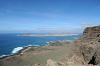 The town of Haría in Lanzarote. The archipelago Chinijo seen from the viewpoint of Guinate. Click to enlarge the image in Adobe Stock (new tab).