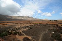 The town of La Oliva in Fuerteventura. Morro de los Rincones and Montaña Tindaya seen from the Casa de los Coroneles. Click to enlarge the image in Adobe Stock (new tab).