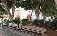 The town of Pájara in Fuerteventura. A park bench in the Plaza of Our Lady of Regla. Click to enlarge the image in Adobe Stock (new tab).