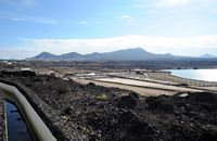 The town of Yaiza in Lanzarote. The salt marshes of Janubio. Click to enlarge the image in Adobe Stock (new tab).