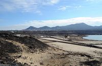 The town of Yaiza in Lanzarote. The salt marshes of Janubio. Click to enlarge the image in Adobe Stock (new tab).