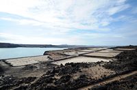 The town of Yaiza in Lanzarote. The salt marshes of Janubio. Click to enlarge the image in Adobe Stock (new tab).