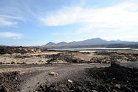 The town of Yaiza in Lanzarote. The salt marshes of Janubio. Click to enlarge the image in Adobe Stock (new tab).