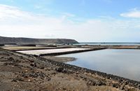 The town of Yaiza in Lanzarote. The salt marshes of Janubio. Click to enlarge the image in Adobe Stock (new tab).