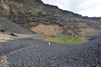 The town of Yaiza in Lanzarote. The Green Lagoon at El Golfo. Click to enlarge the image in Adobe Stock (new tab).
