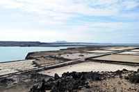 The town of Yaiza in Lanzarote. The salt of Janubio. Click to enlarge the image in Adobe Stock (new tab).