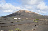 The town of Yaiza in Lanzarote. La Geria Vineyards. Click to enlarge the image in Adobe Stock (new tab).