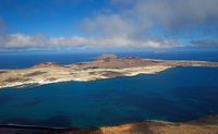 The island of Graciosa to Lanzarote. Island view from the Mirador del Río (afrank99 author). Click to enlarge the image.
