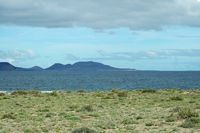 The island of Graciosa to Lanzarote. Island view from La Caleta de Famara. Click to enlarge the image.