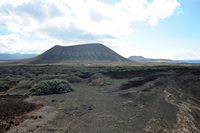 The island of Graciosa to Lanzarote. Volcanoes El Mojon and Montaña Amarilla. Click to enlarge the image.