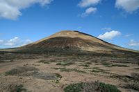 The island of Graciosa to Lanzarote. The volcano Agujas Grandes. Click to enlarge the image.