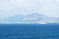 The island of Lobos in Fuerteventura. La Hacha Grande mountain in Lanzarote for Lobos. Click to enlarge the image.