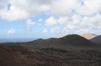 Timanfaya National Park in Lanzarote. Caldera Blanca view from the Islote de Hilario. Click to enlarge the image.