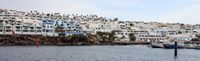 The town of Puerto del Carmen in Lanzarote. Vacation homes (author Lmbuga). Click to enlarge the image.