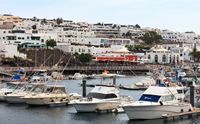 The town of Puerto del Carmen in Lanzarote. The port (author Lmbuga). Click to enlarge the image.
