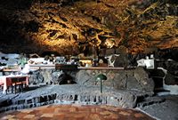 The chasms of Jameos del Agua in Haría in Lanzarote. Bar Jameo Grande. Click to enlarge the image.