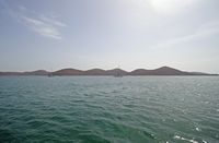 Le village d’Élounda en Crète. La presqu'île de Spinalonga vue depuis Élounda. Cliquer pour agrandir l'image dans Adobe Stock (nouvel onglet).